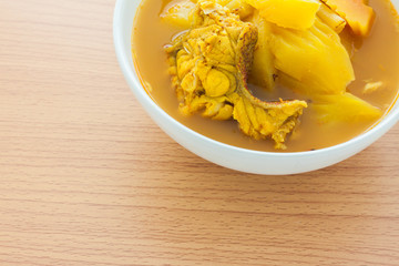 Yellow curry with fish and papaya