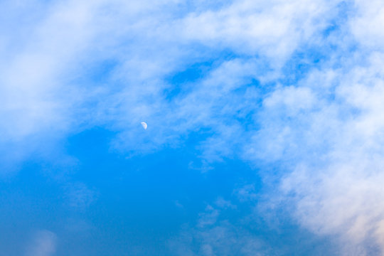 Moon on blue sky with cloud