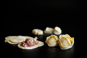 traditional raw manti with meat inside