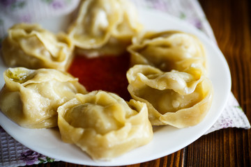 Traditional boiled manti in a plate