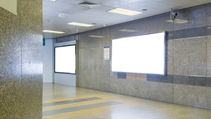 Blank billboard in subway. Useful for your advertising.