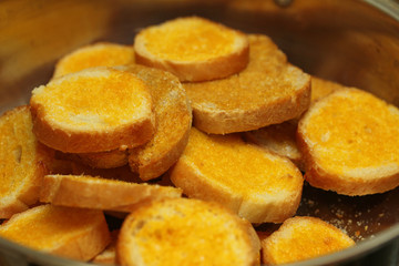 Crispy butter toast with spicy sour sauce.