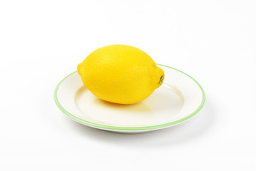 ripe lemon on plate