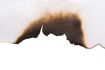 Burned sheet of paper on a white background