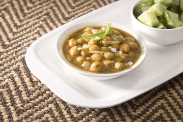 Chana Masala or Spicy Chick Peas with salad