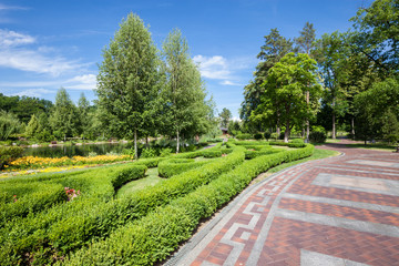 Spring green city park at sunny day