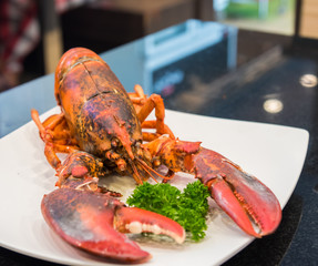 grill canadian lobter on plate.
