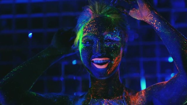 girl dancing in the ultraviolet light