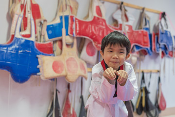 boy training in taekwondo class.