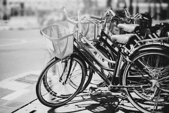 black and white travel bicycle for rent in urban. vintage color effect © jakkapan