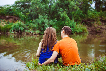 couple by the river