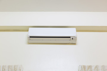 Air conditioner (AC) indoor unit or evaporator and wall mounted. That is part of mini split system or ductless system type. For removing heat and moisture from room, Temperature and humidity control.