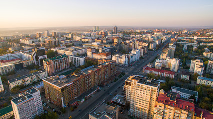 Ufa city at sunset in center. Aerial view