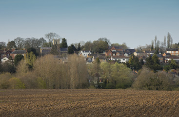 Fototapeta na wymiar Village In England / An image of the small village of Thurnby captured in the evening sun, Leicestershire, England, UK.