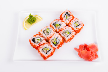 Asia. California rolls with eel on a white plate on a white background