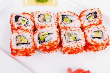 Asia. California rolls with eel on a white plate on a white background