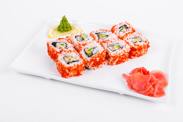 Asia. California rolls with eel on a white plate on a white background