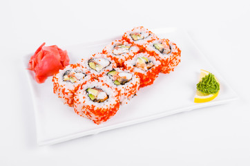 Asia. California rolls on a white plate on a white background