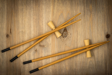 Japanese sushi chopsticks on wooden stone background. Top view with copy space