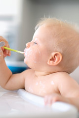 Feeding baby with spoon