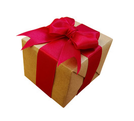 Gift box wrapped in recycled brown paper with red ribbon bow isolated on white backgrounds.