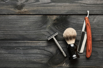 Vintage barber shop tools on wooden background