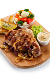 Roast steak on cutting board