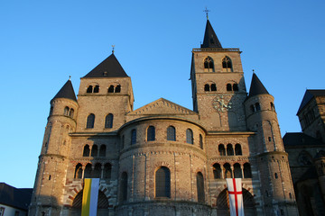 Fototapeta na wymiar Trier Dom Cathedral with flags Trèves