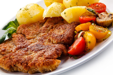 Fried pork chop with potatoes