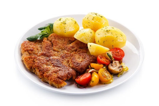 Fried pork chop with potatoes