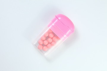 Sweet candy in the plastic container box.