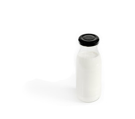 bottle of milk on white background