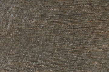 Gray concrete wall with plaster relief. Background texture