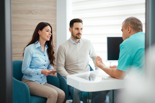 Patients consulting the dentist at dental clinic