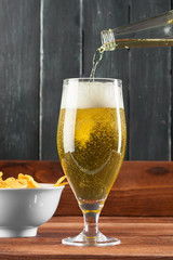 Glass of beer and beer bottle