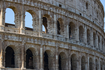 Fototapeta premium Colosseum - the main tourist attractions of Rome, Italy. Ancient Rome Ruins of Roman Civilization.