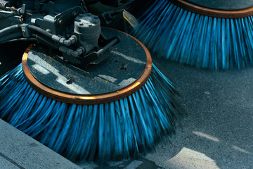 Brushs of street cleaning machine on street