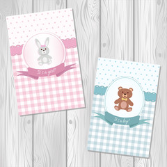 Baby boy and baby girl shower or arrival cards with teddy bear and toy rabbit on wooden texture background. Flat design
