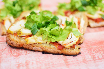 sandwich with chicken meat and lettuce 