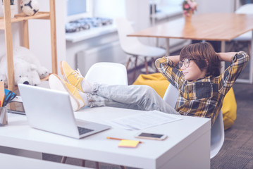 Thoughtful child daydreaming at home