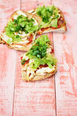 sandwich with chicken meat and lettuce 
