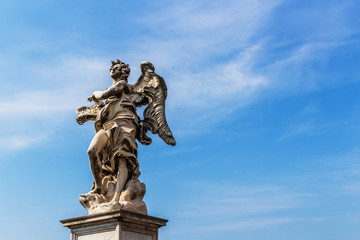 Fototapeta na wymiar A color photo of one of the famous angel sculptures at Castel Sant'Angelo in Rome, Italy. 
