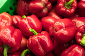 Obraz na płótnie Canvas Fresh red organic sweet bell peppers on the farmer market on a tropical island Bali, Indonesia. Organic background.