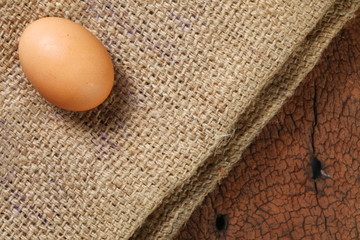 Egg put on the old brown color sack.