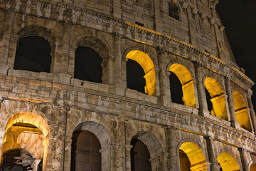 Colosseum at night- the main tourist attractions of Rome, Italy. Ancient Rome Ruins of Roman Civilization.