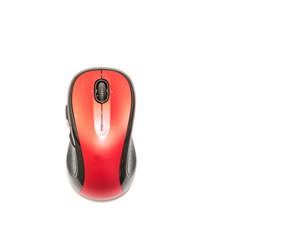 Close-up red and black wireless mouse in contoured shape isolated on white background. Modern computer mouse with soft rubber grips, back-forward and side to side scrolling buttons.  Top view.