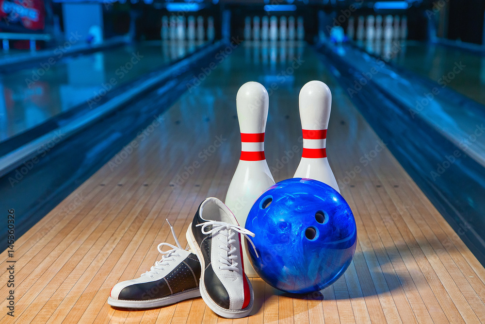 Wall mural bowling shoes, bowling pins and ball for play in bowling