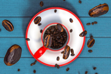 3d rendering top view of beans Soar out of a red coffee cup on a blue wooden table. focus on foreground.