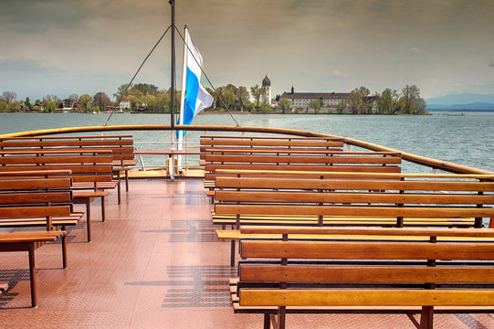 Passenger boat deck. Passenger ship approaching the pier of Women s island, Chiemsee lake, Bavaria, Germany