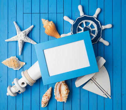 Summer holiday vacation photo frame mock up template with nautical decorations. View from above